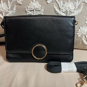 Sleek Black and Gold Crossbody Bag with Leather Finish